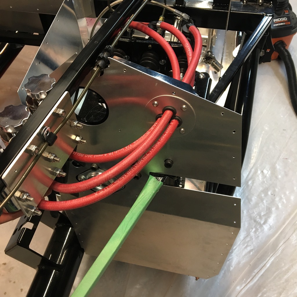 Brake line routing through firewall